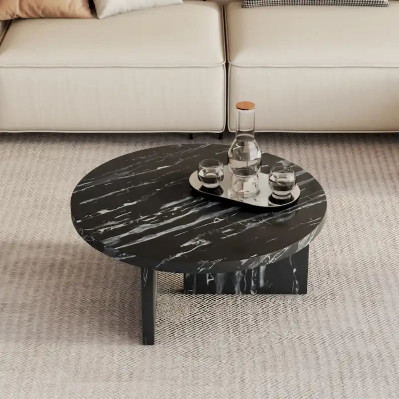 A white MDF material circular patterned coffee table suitable for small spaces and living rooms.